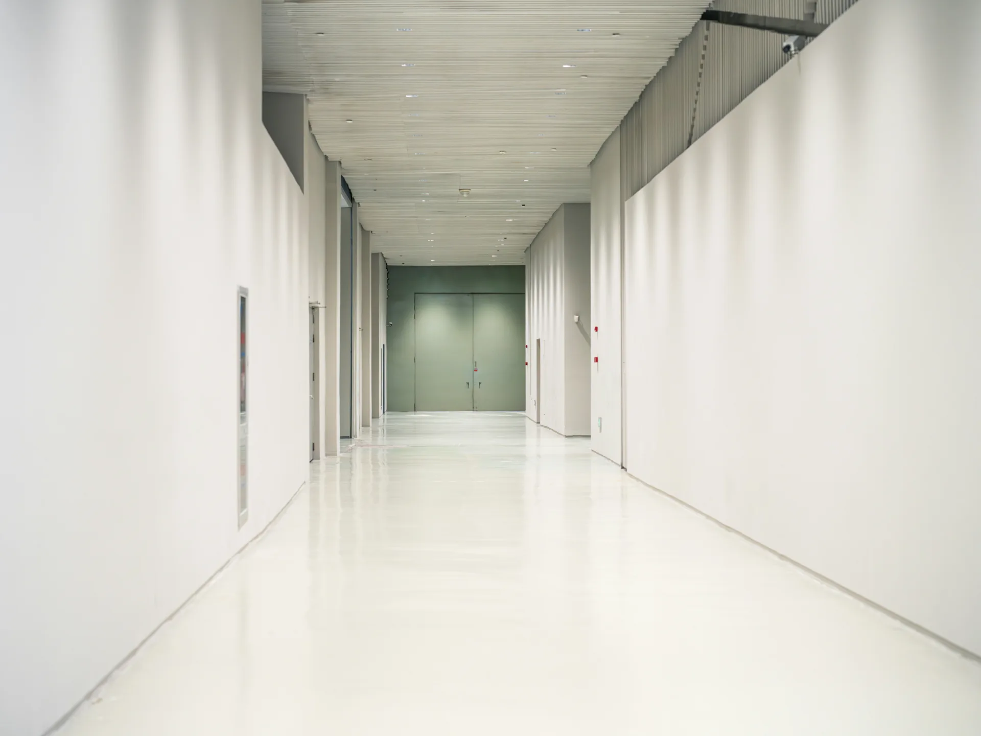 white epoxy commercial floor in a Boston corridor