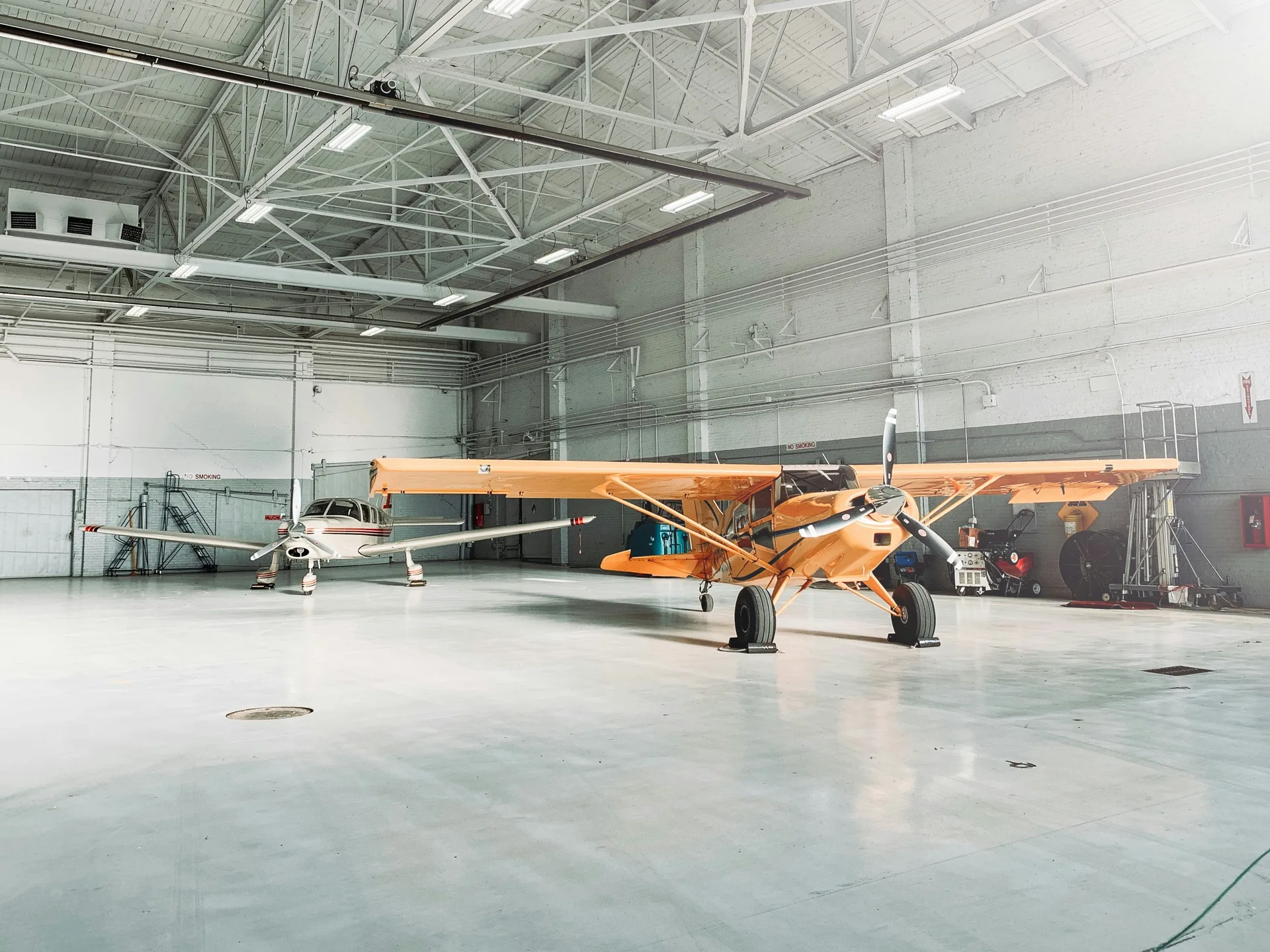 epoxy-coated aircraft hangar floor in a Boston facility