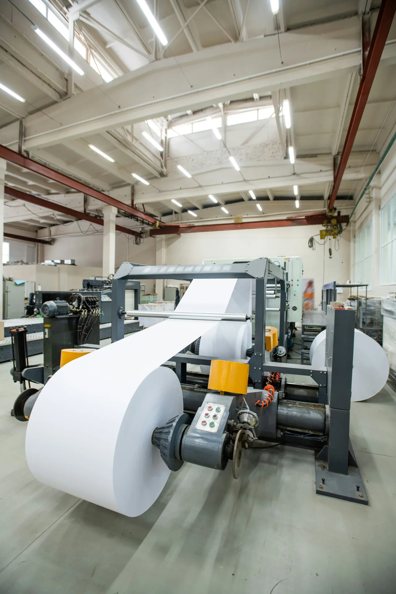 industrial concrete floor under a Boston printing press