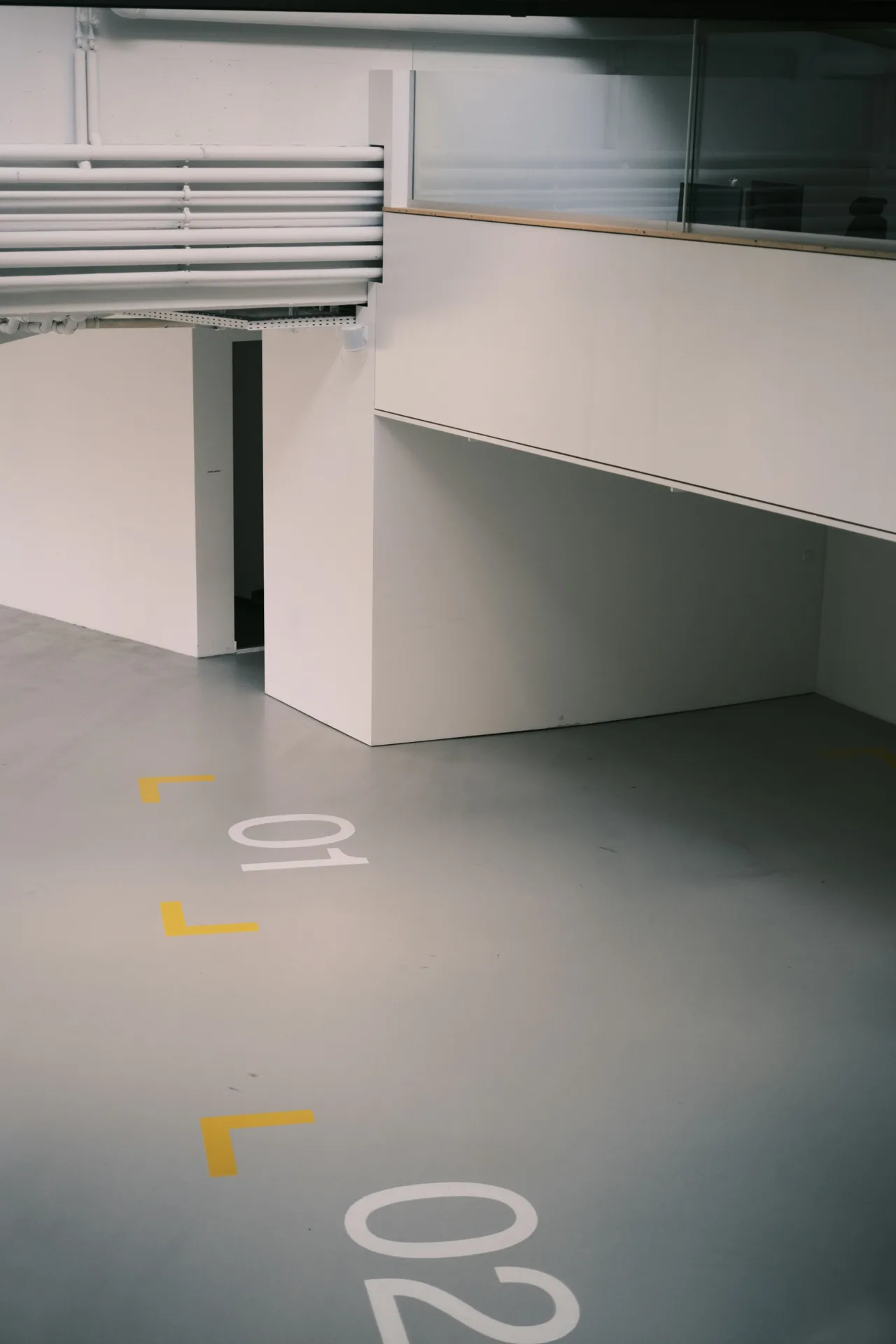 coated warehouse floor with line marking in a Boston facility
