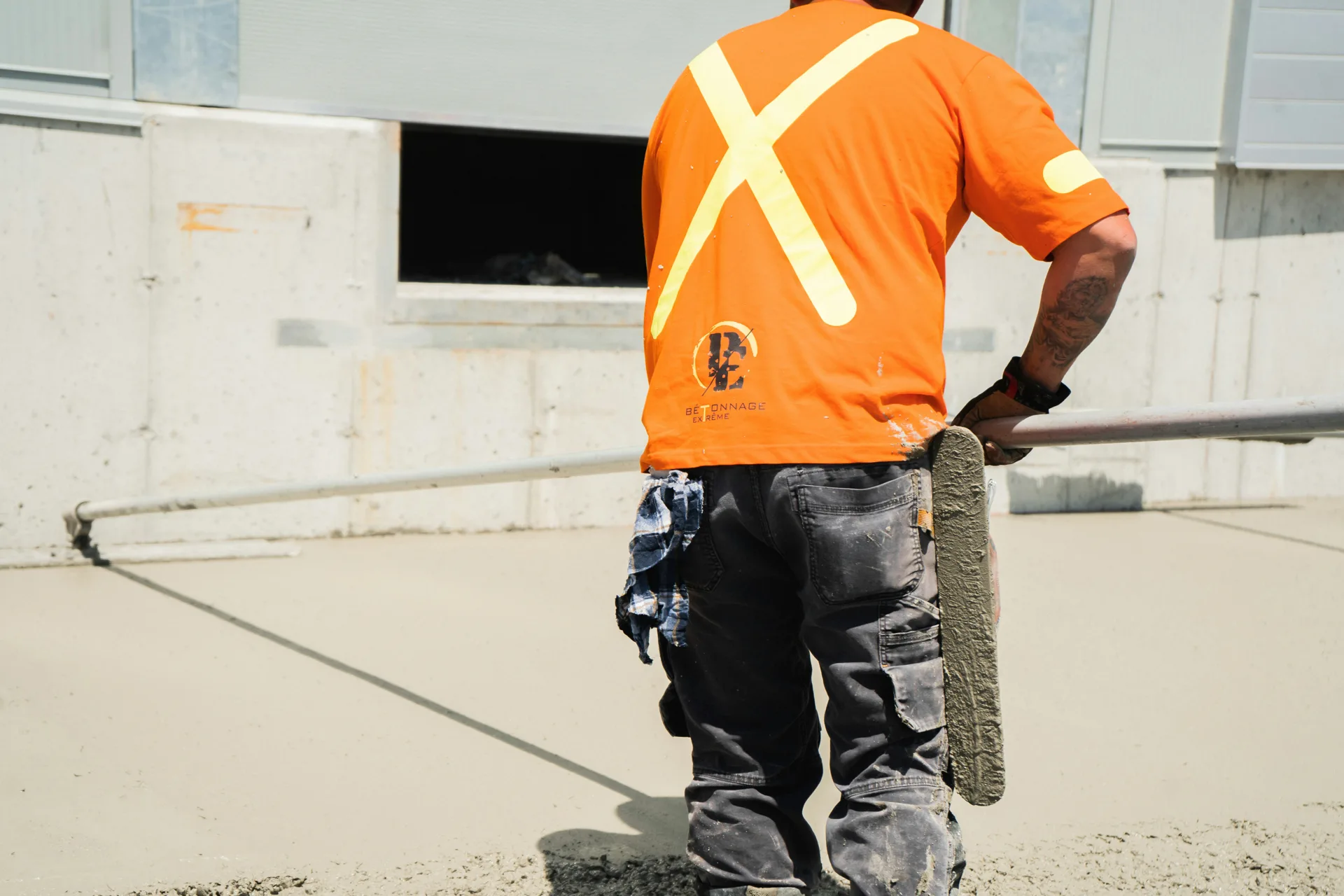 finisher working an Ardex application on a Boston floor