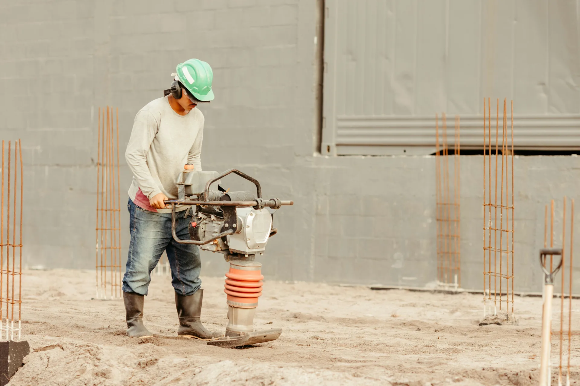 base prep before a driveway repair pour in Boston