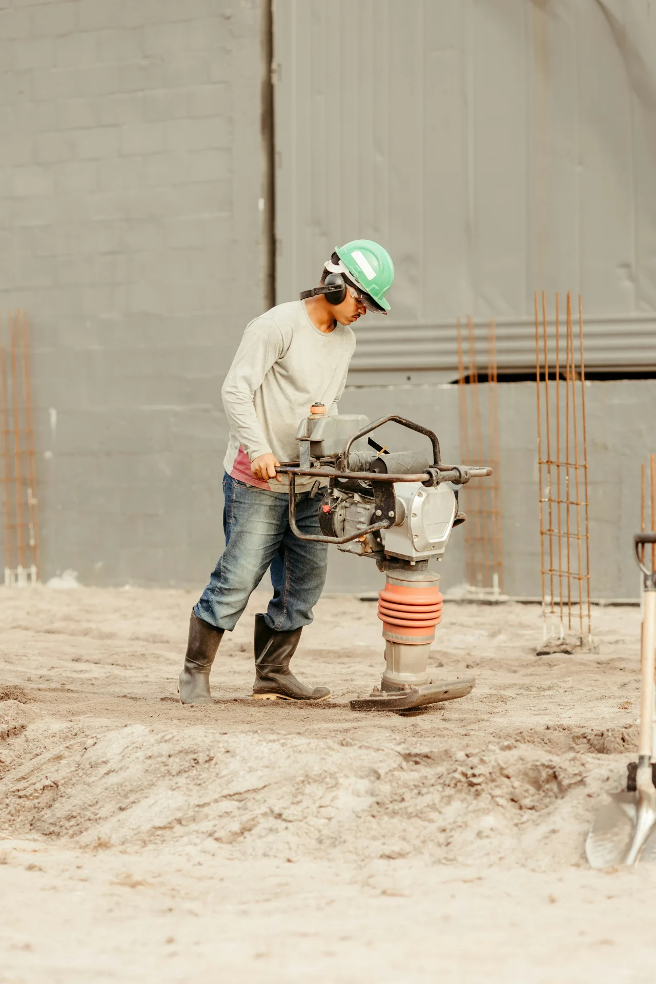 sub-grade prep before a concrete pour calculated by volume in Boston