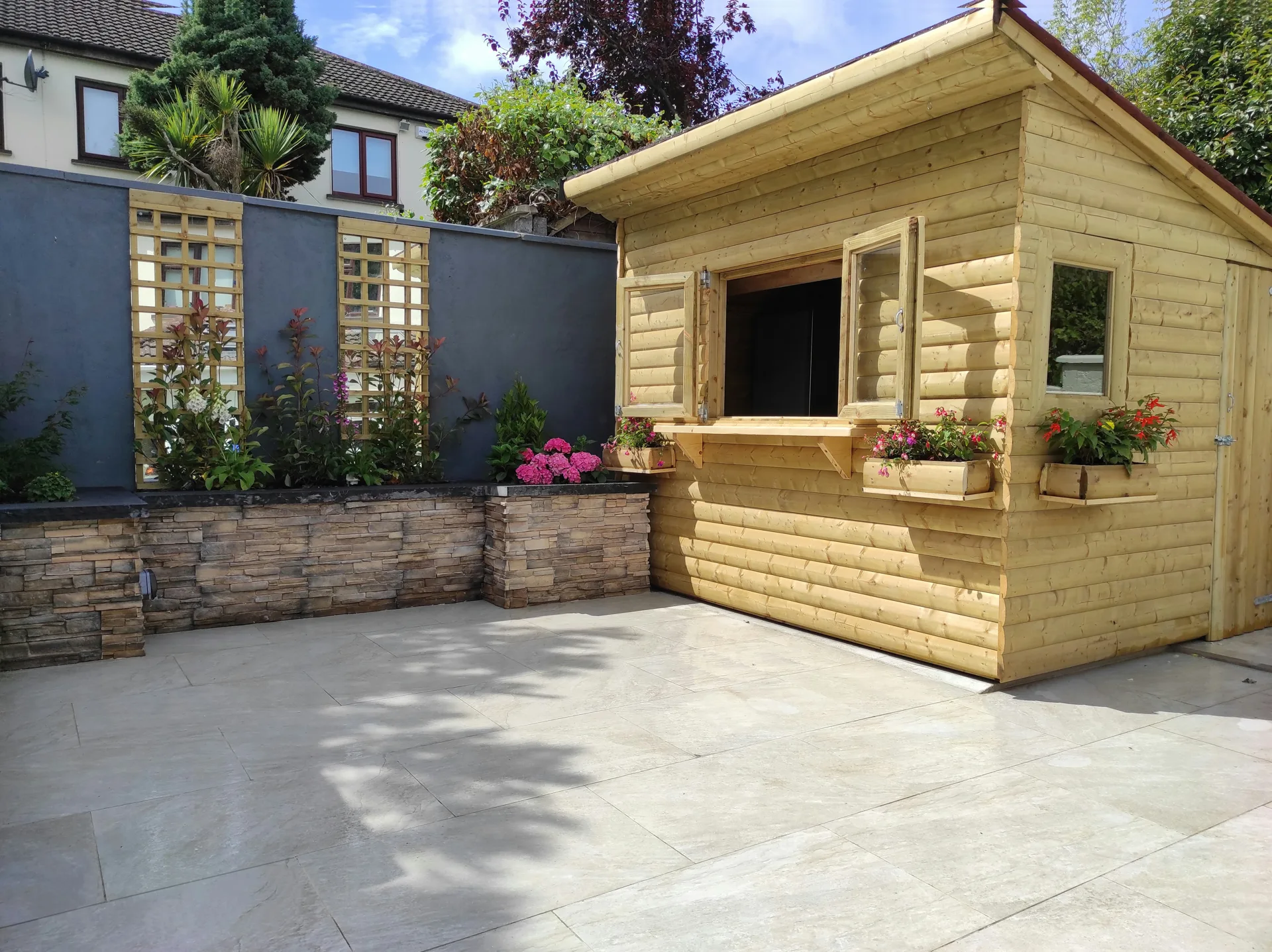 refreshed patio in a Boston garden after repair