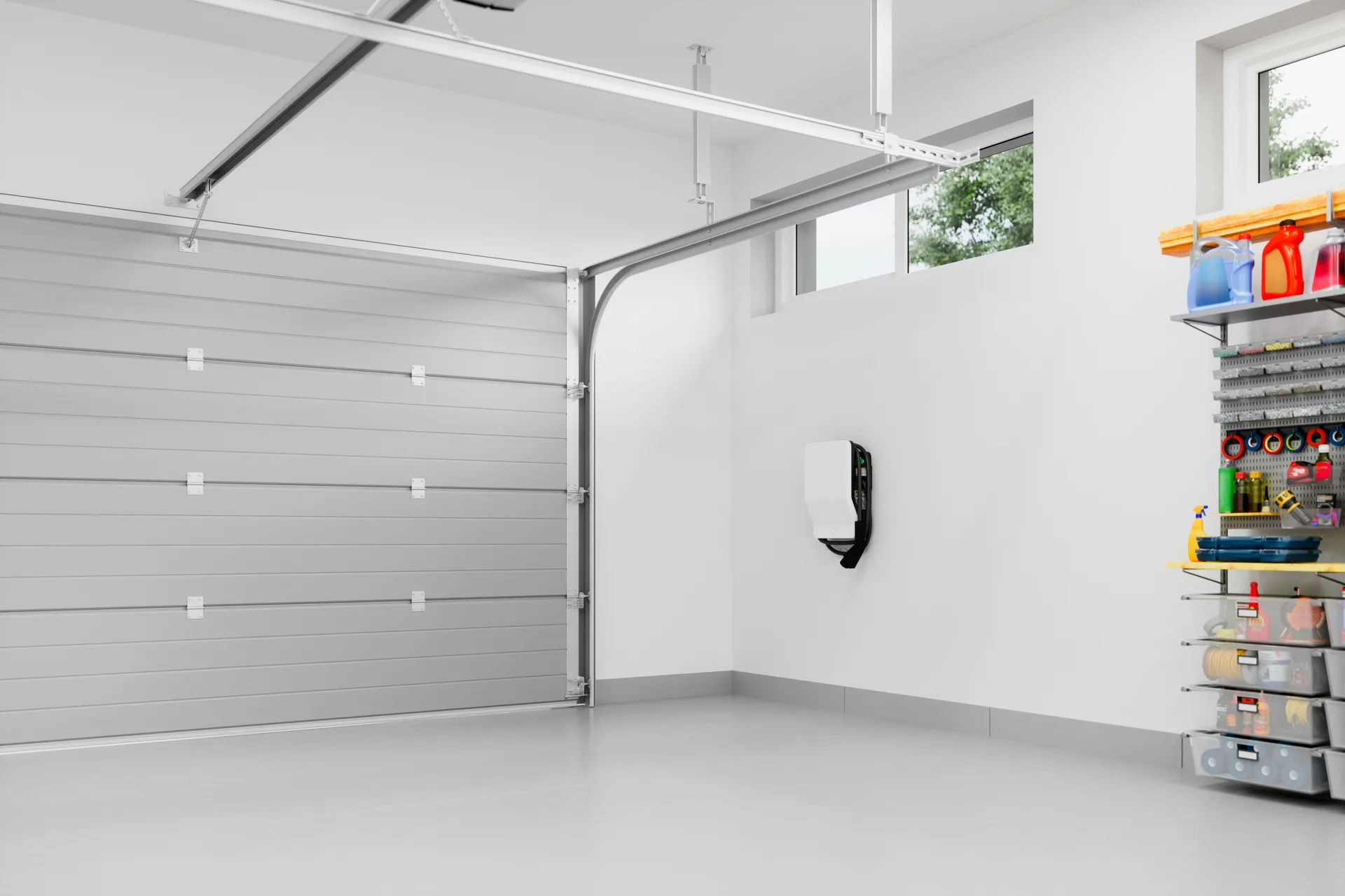 epoxy-coated garage floor with an EV charger at a Boston home