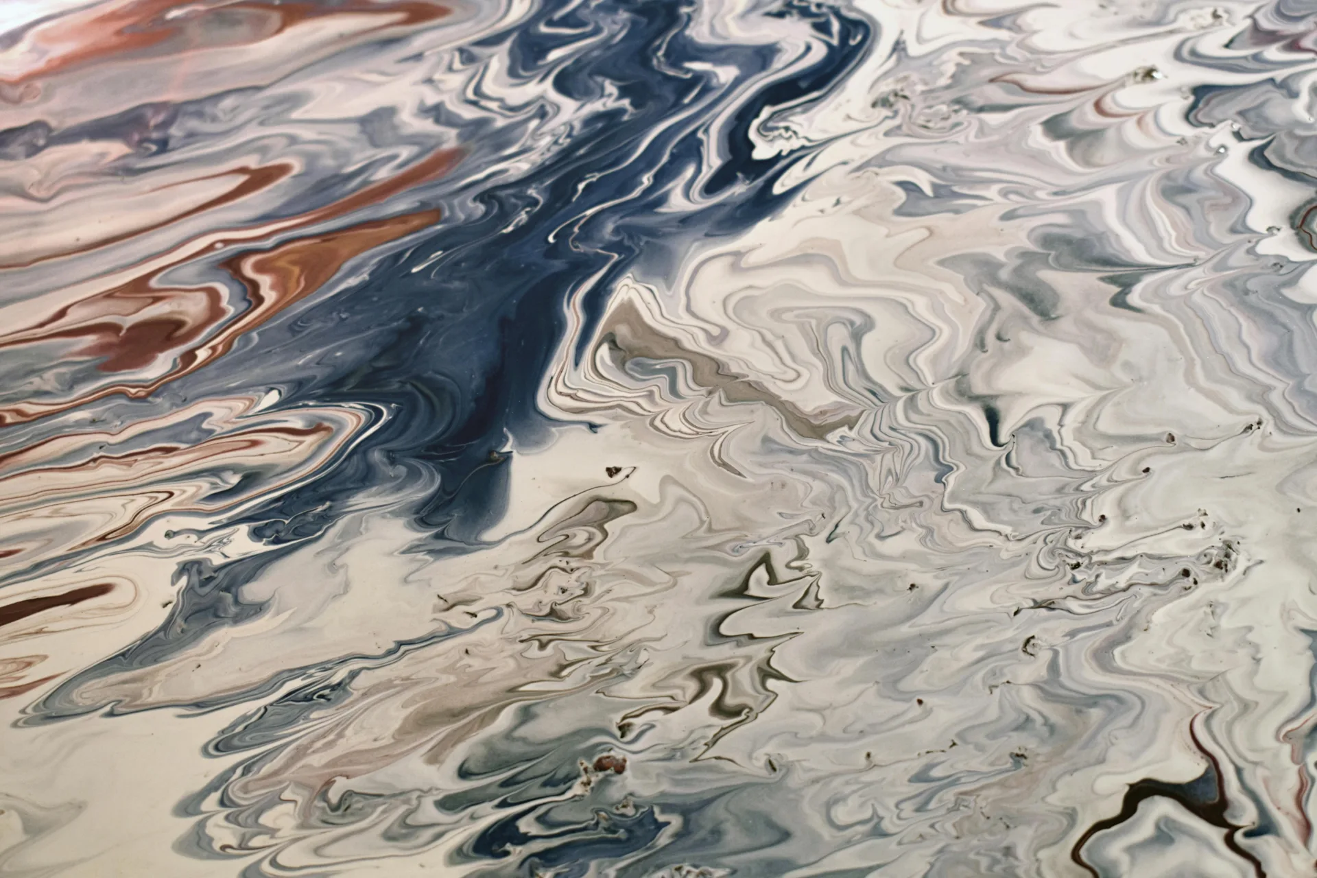 metallic epoxy garage floor with a swirl pattern in Boston