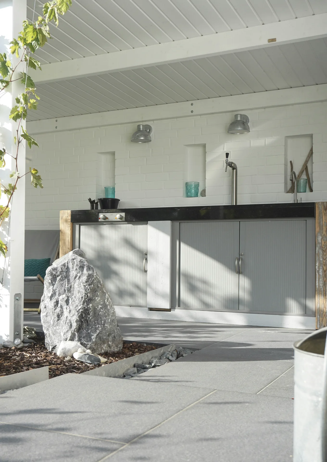 polished concrete outdoor bar counter at a Boston home
